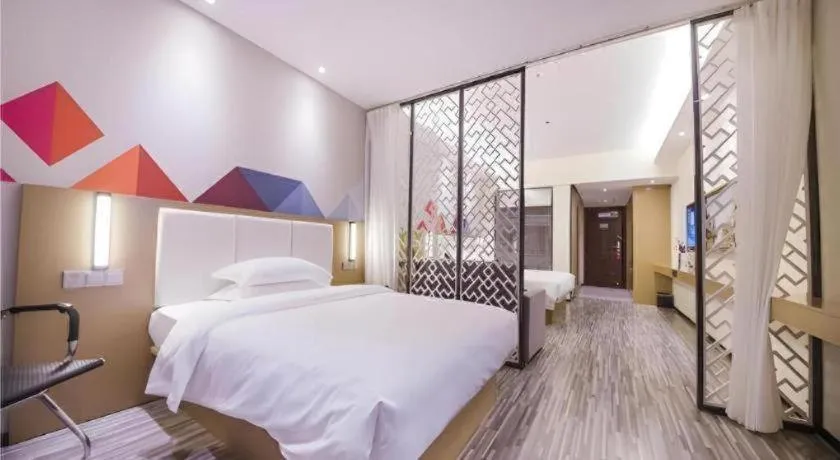 Bed in Borrman Hotel Guilin High-speed Railway North Station Evergrande Plaza