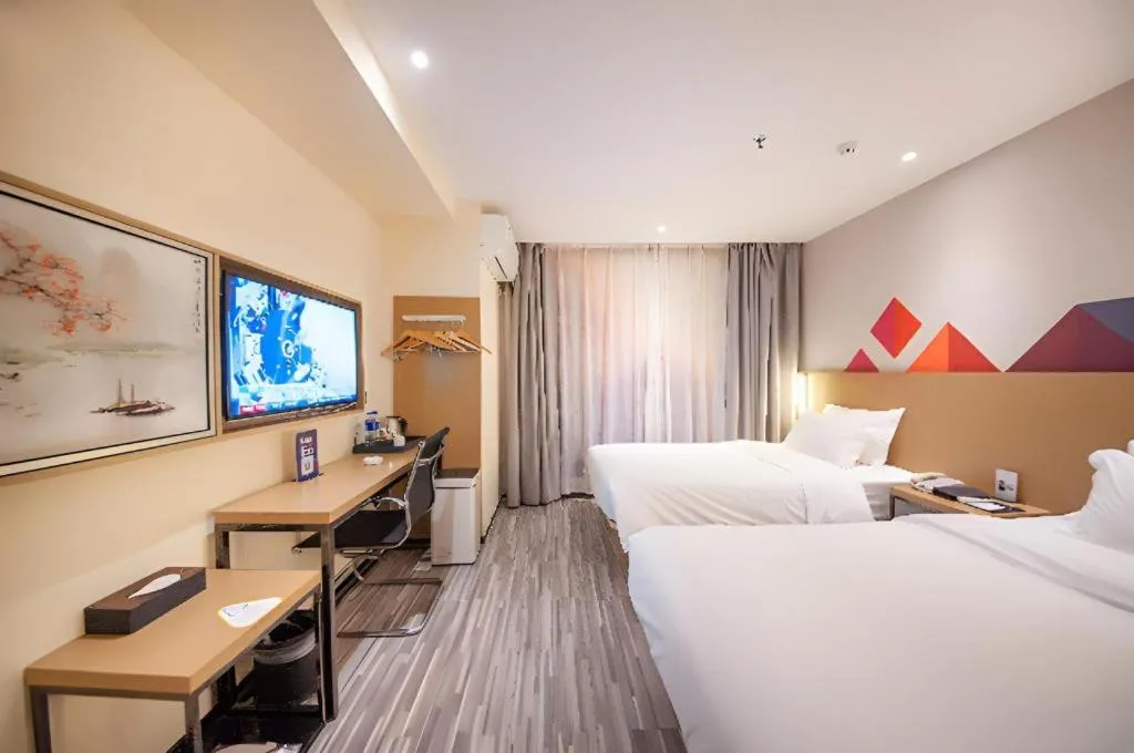 Bed in Borrman Hotel Guilin High-speed Railway North Station Evergrande Plaza
