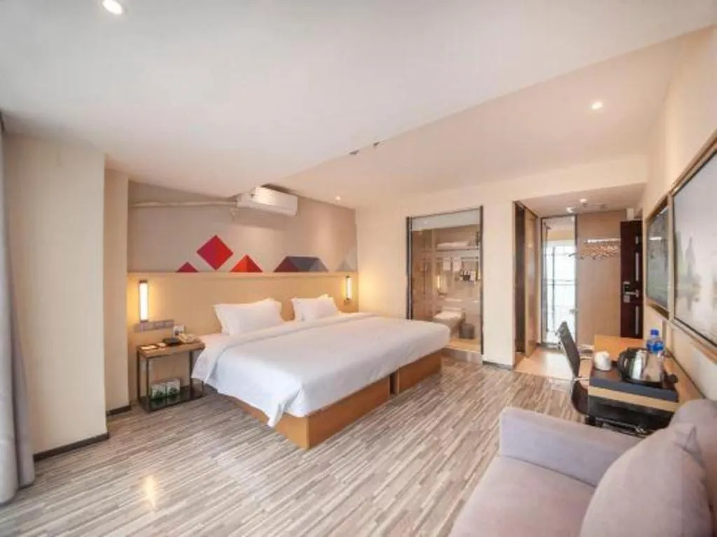 Bed in Borrman Hotel Guilin High-speed Railway North Station Evergrande Plaza