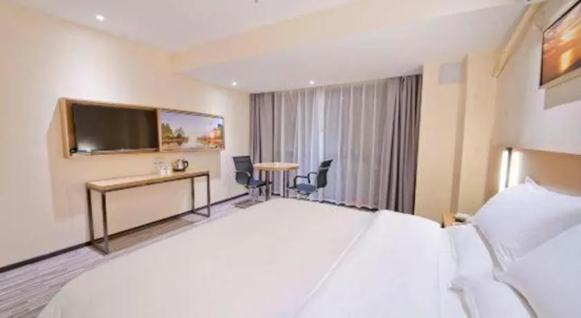 Bed in Borrman Hotel Guilin High-speed Railway North Station Evergrande Plaza