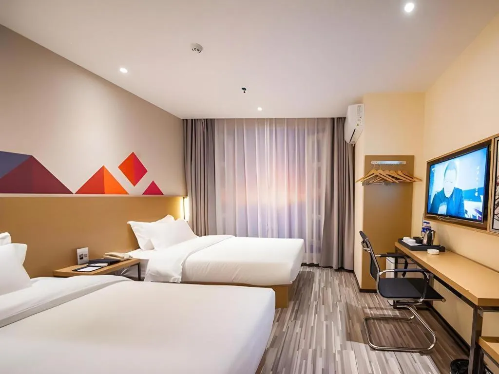 Bed in Borrman Hotel Guilin High-speed Railway North Station Evergrande Plaza
