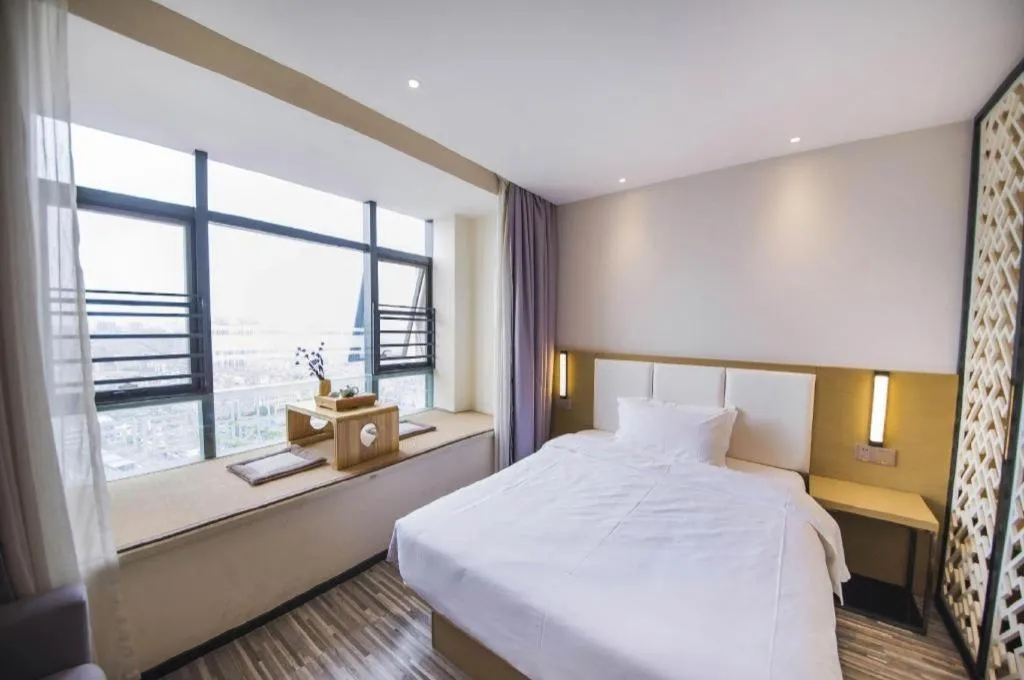 Bed in Borrman Hotel Guilin High-speed Railway North Station Evergrande Plaza