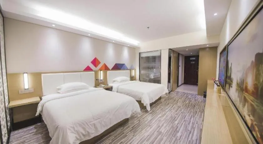 Bed in Borrman Hotel Guilin High-speed Railway North Station Evergrande Plaza