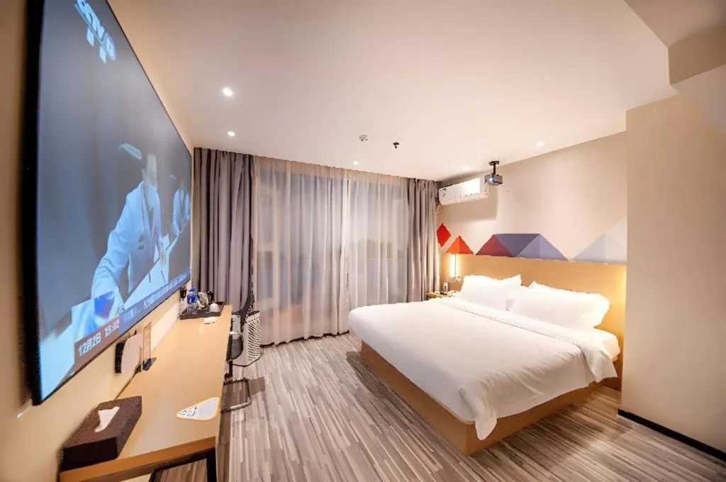 Bed in Borrman Hotel Guilin High-speed Railway North Station Evergrande Plaza