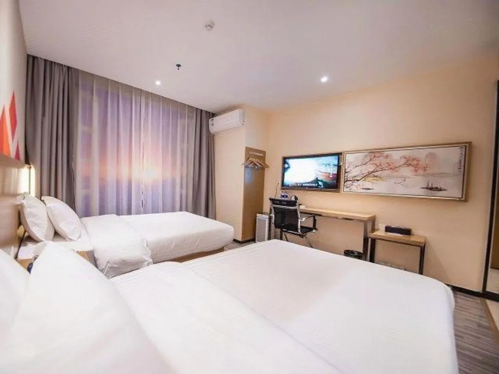 Bed in Borrman Hotel Guilin High-speed Railway North Station Evergrande Plaza