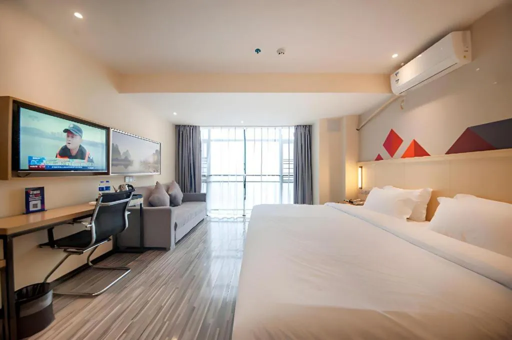 Bed in Borrman Hotel Guilin High-speed Railway North Station Evergrande Plaza