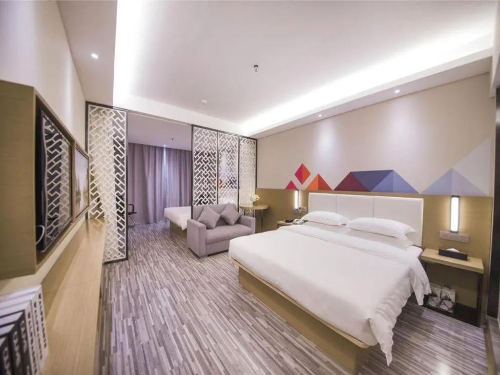 Bed in Borrman Hotel Guilin High-speed Railway North Station Evergrande Plaza