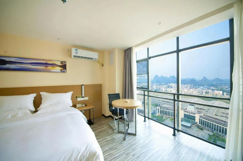 Bed in Borrman Hotel Guilin High-speed Railway North Station Evergrande Plaza