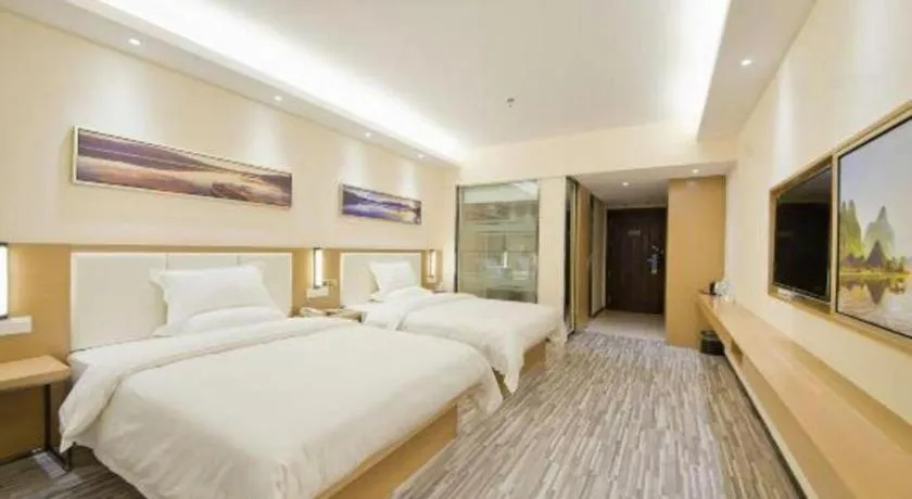 Bed in Borrman Hotel Guilin High-speed Railway North Station Evergrande Plaza