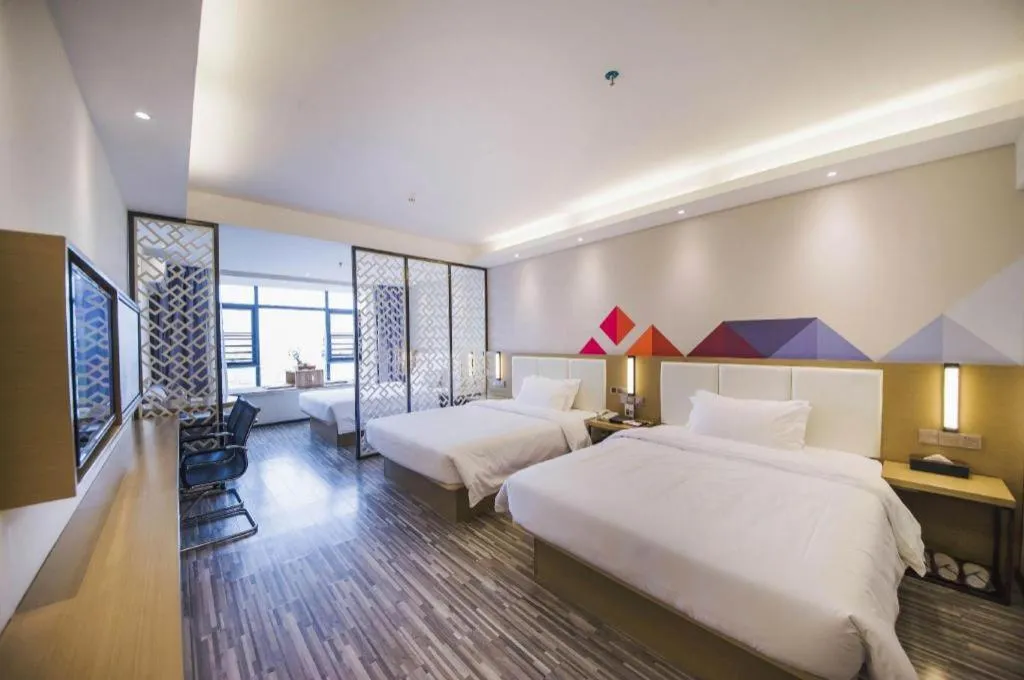 Bed in Borrman Hotel Guilin High-speed Railway North Station Evergrande Plaza