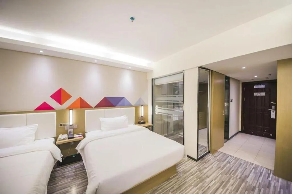 Bed in Borrman Hotel Guilin High-speed Railway North Station Evergrande Plaza