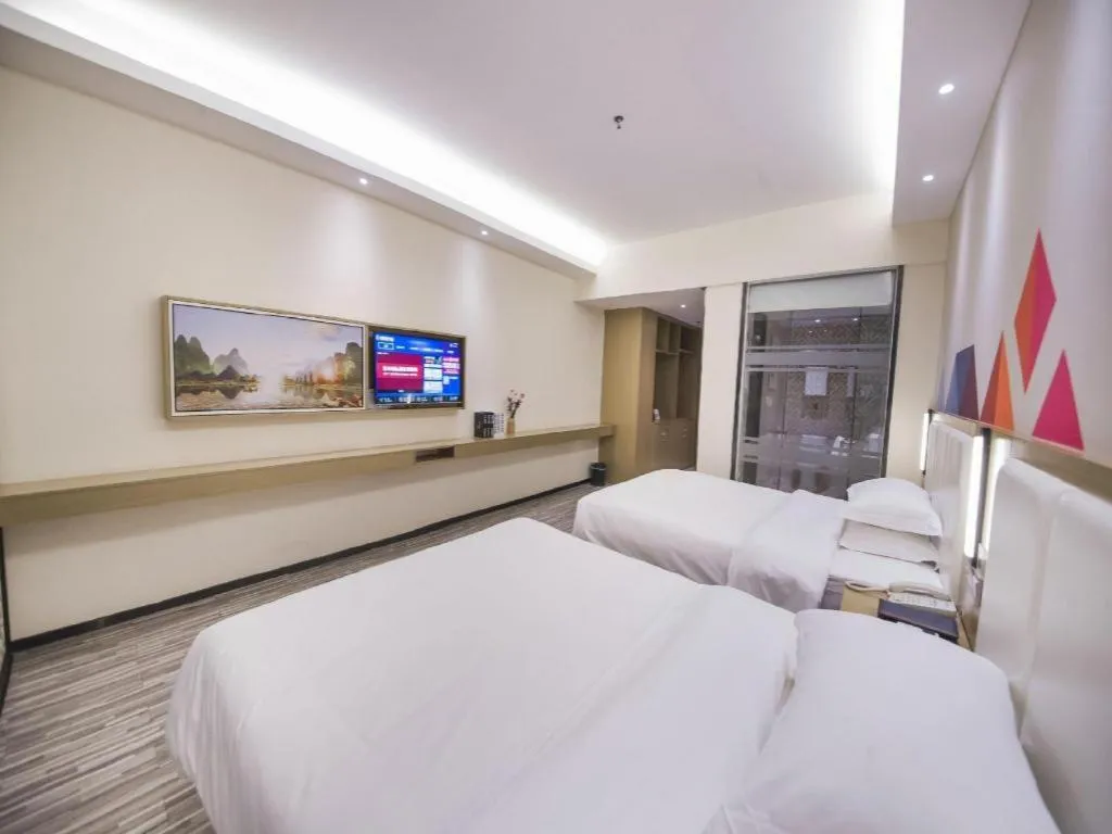 Bed in Borrman Hotel Guilin High-speed Railway North Station Evergrande Plaza
