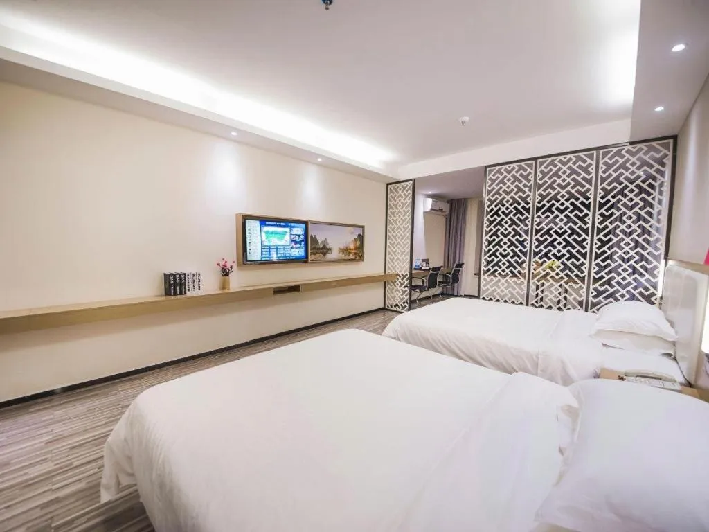 Bed in Borrman Hotel Guilin High-speed Railway North Station Evergrande Plaza