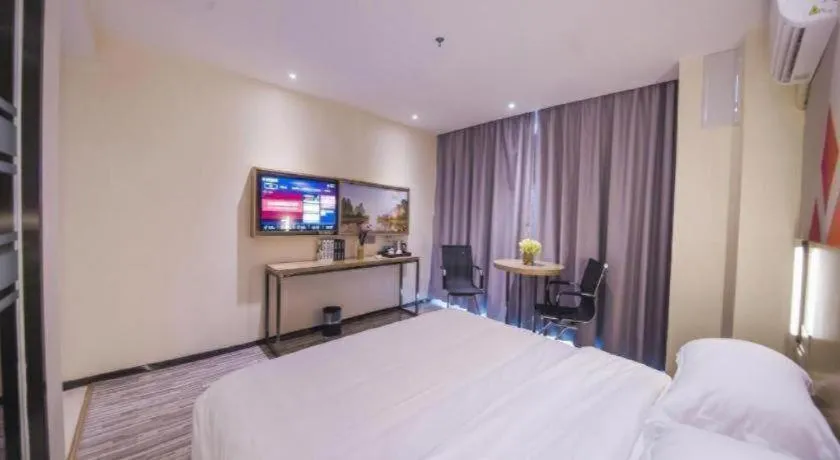 Bed in Borrman Hotel Guilin High-speed Railway North Station Evergrande Plaza