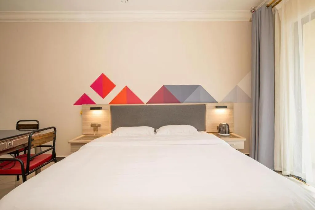 Bed in Borrman Hotel Guilin High-speed Railway North Station Evergrande Plaza