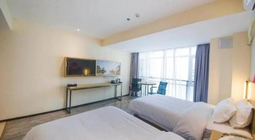 Bed in Borrman Hotel Guilin High-speed Railway North Station Evergrande Plaza