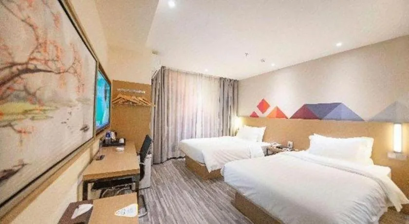 Bed in Borrman Hotel Guilin High-speed Railway North Station Evergrande Plaza