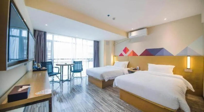 Bed in Borrman Hotel Guilin High-speed Railway North Station Evergrande Plaza