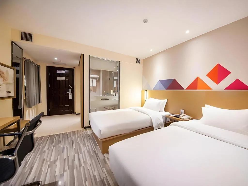 Bed in Borrman Hotel Guilin High-speed Railway North Station Evergrande Plaza