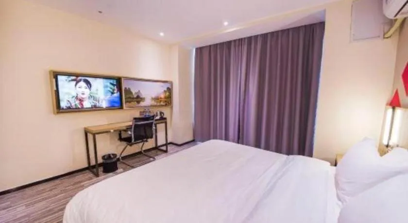 Bed in Borrman Hotel Guilin High-speed Railway North Station Evergrande Plaza