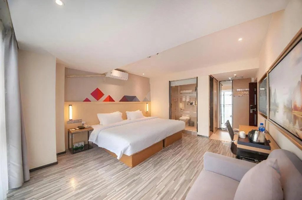 Bed in Borrman Hotel Guilin High-speed Railway North Station Evergrande Plaza