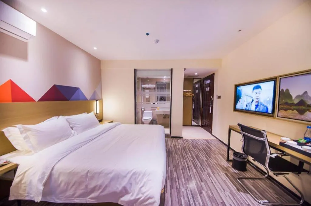 Bed in Borrman Hotel Guilin High-speed Railway North Station Evergrande Plaza