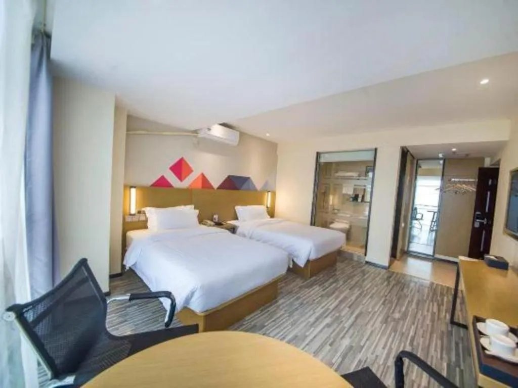 Bed in Borrman Hotel Guilin High-speed Railway North Station Evergrande Plaza