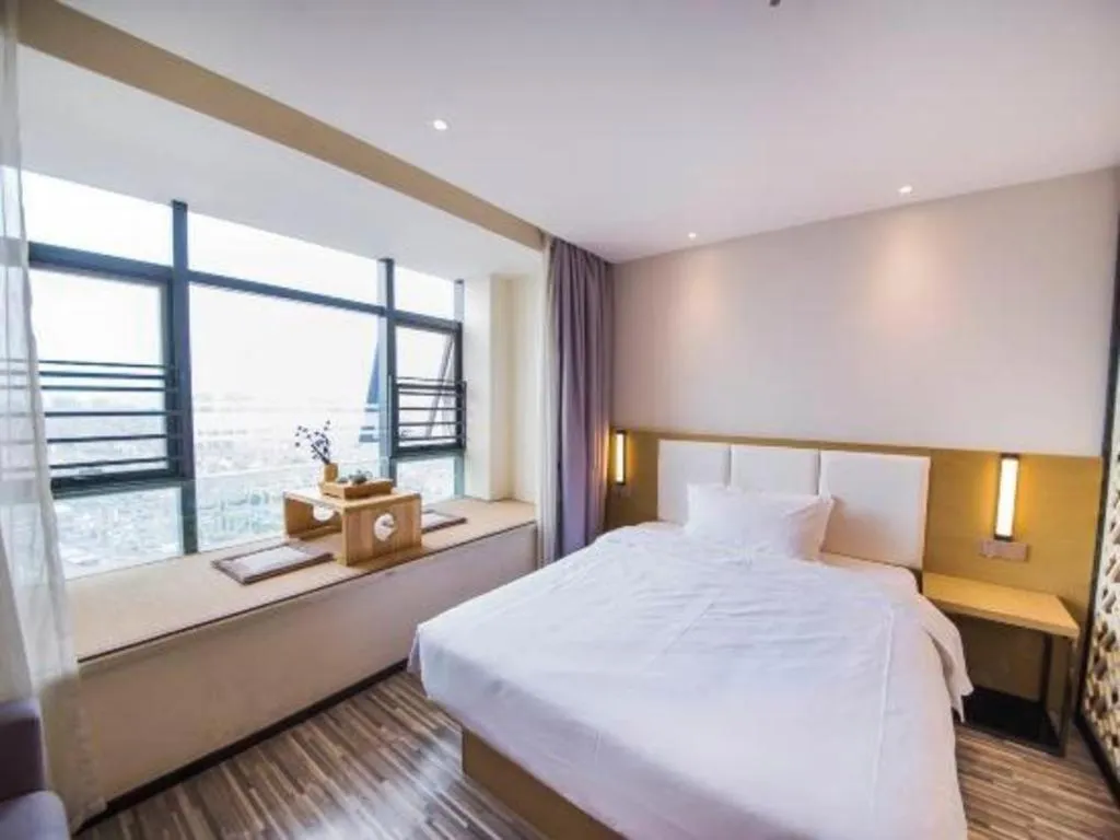 Bed in Borrman Hotel Guilin High-speed Railway North Station Evergrande Plaza