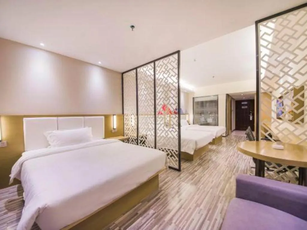 Bed in Borrman Hotel Guilin High-speed Railway North Station Evergrande Plaza