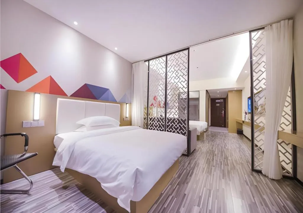 Bed in Borrman Hotel Guilin High-speed Railway North Station Evergrande Plaza