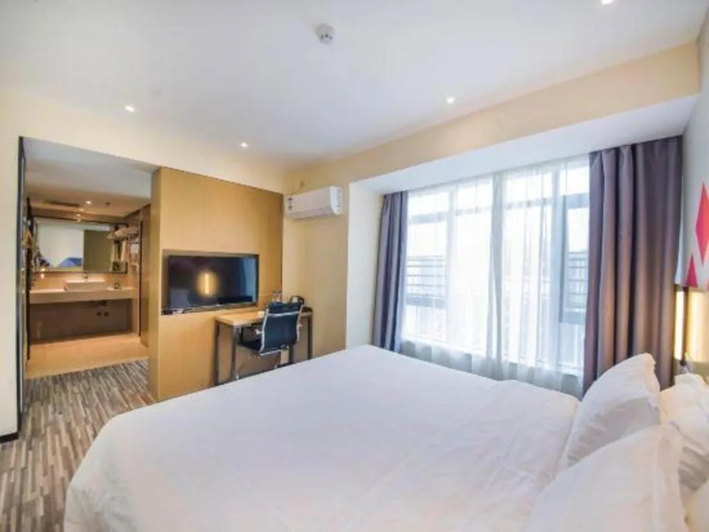 Bed in Borrman Hotel Guilin High-speed Railway North Station Evergrande Plaza