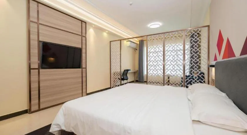 Bed in Borrman Hotel Guilin High-speed Railway North Station Evergrande Plaza