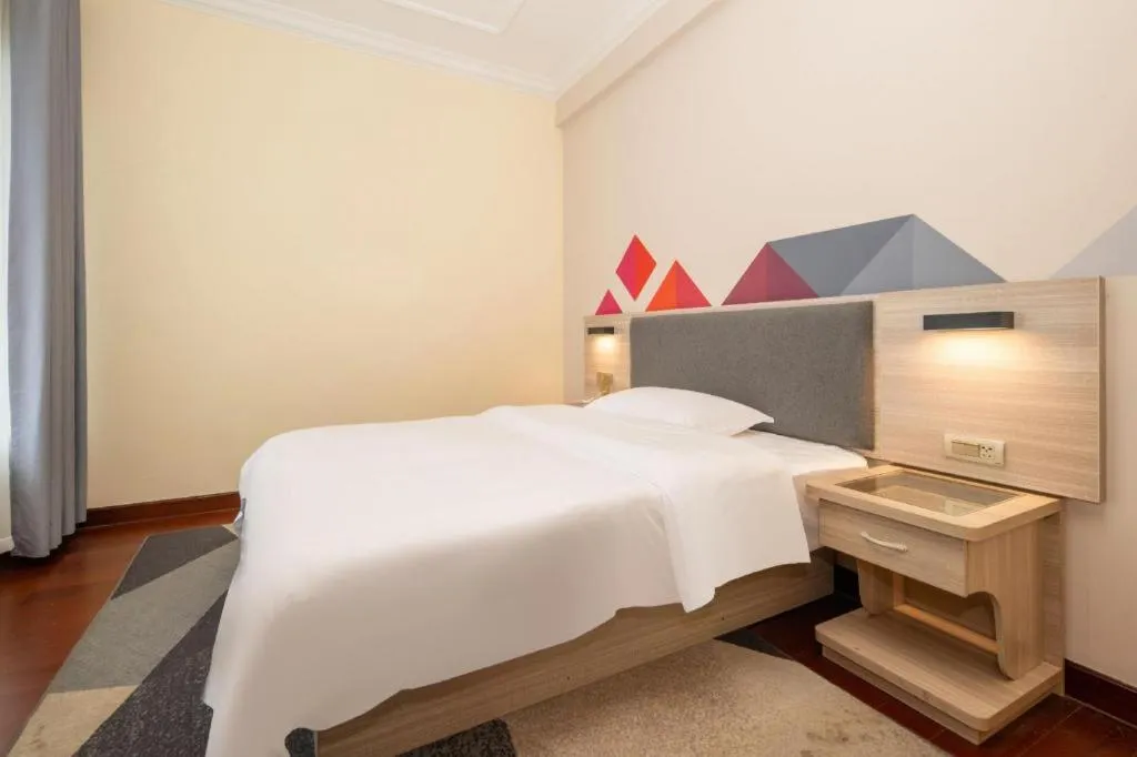 Bed in Borrman Hotel Guilin High-speed Railway North Station Evergrande Plaza