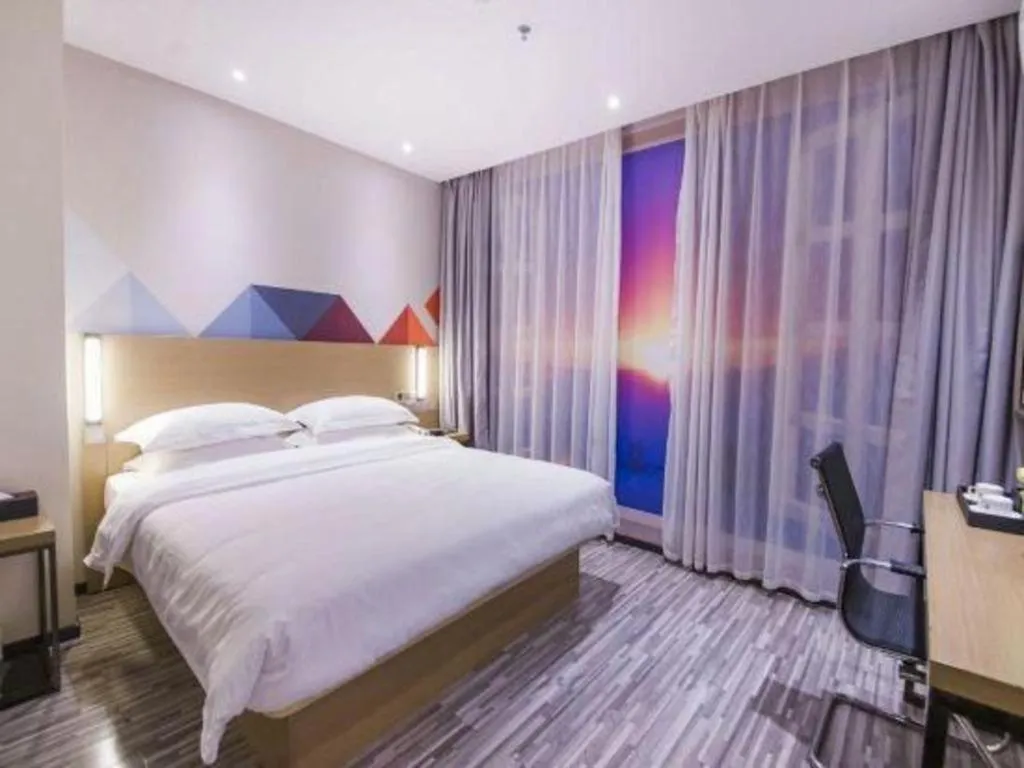 Bed in Borrman Hotel Guilin High-speed Railway North Station Evergrande Plaza