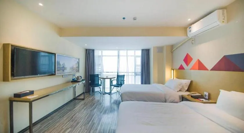 Bed in Borrman Hotel Guilin High-speed Railway North Station Evergrande Plaza