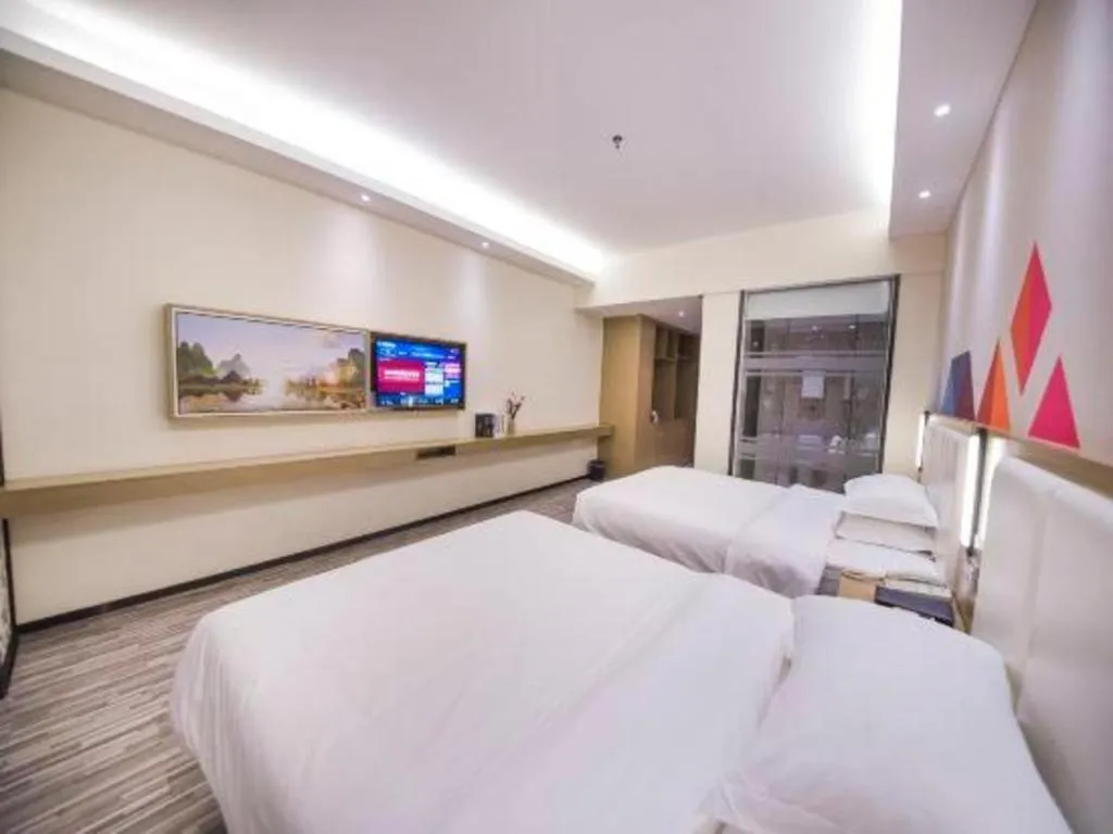 Bed in Borrman Hotel Guilin High-speed Railway North Station Evergrande Plaza