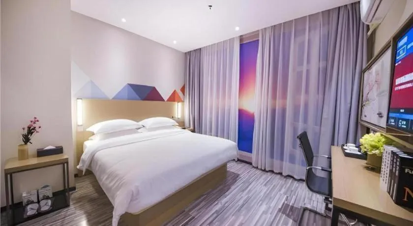 Bed in Borrman Hotel Guilin High-speed Railway North Station Evergrande Plaza