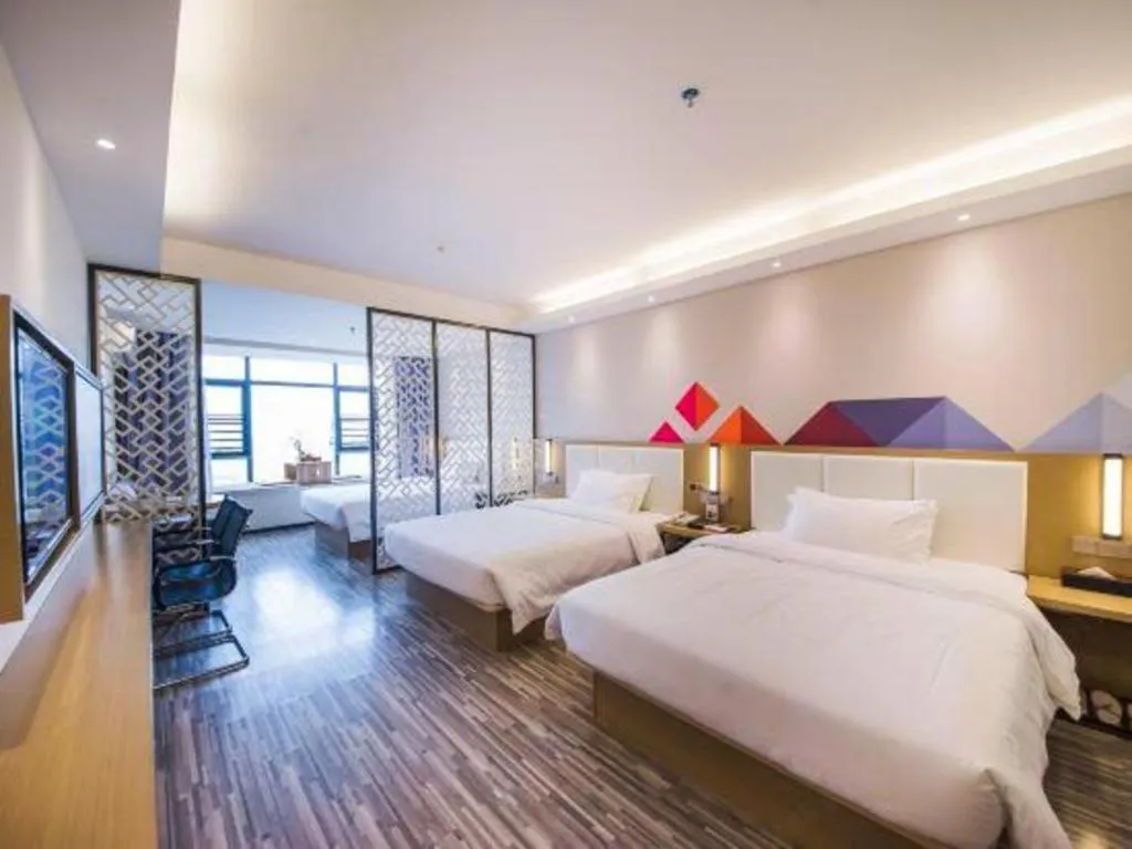 Bed in Borrman Hotel Guilin High-speed Railway North Station Evergrande Plaza
