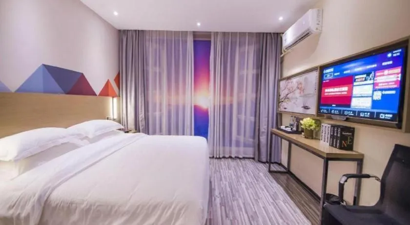 Bed in Borrman Hotel Guilin High-speed Railway North Station Evergrande Plaza