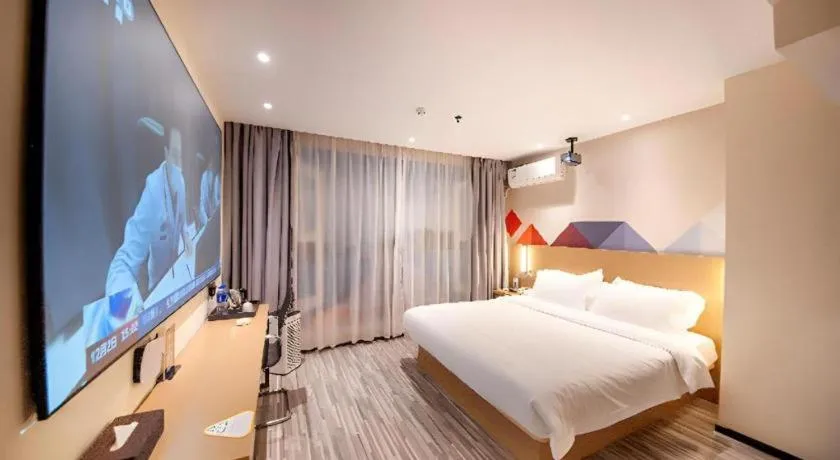Bed in Borrman Hotel Guilin High-speed Railway North Station Evergrande Plaza