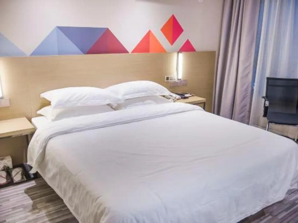 Bed in Borrman Hotel Guilin High-speed Railway North Station Evergrande Plaza