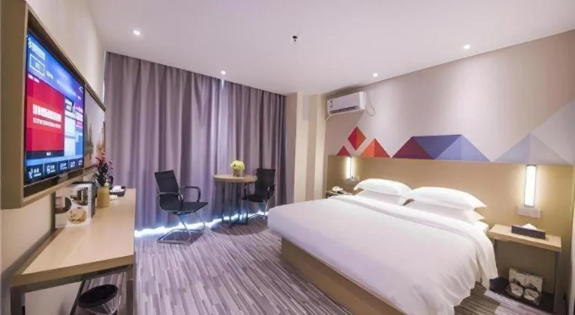 Bed in Borrman Hotel Guilin High-speed Railway North Station Evergrande Plaza