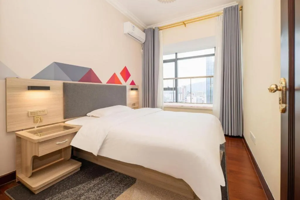 Bed in Borrman Hotel Guilin High-speed Railway North Station Evergrande Plaza