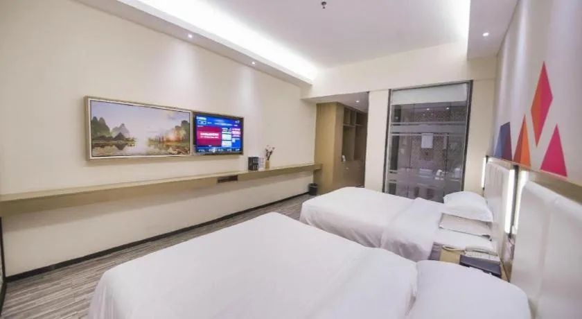 Bed in Borrman Hotel Guilin High-speed Railway North Station Evergrande Plaza