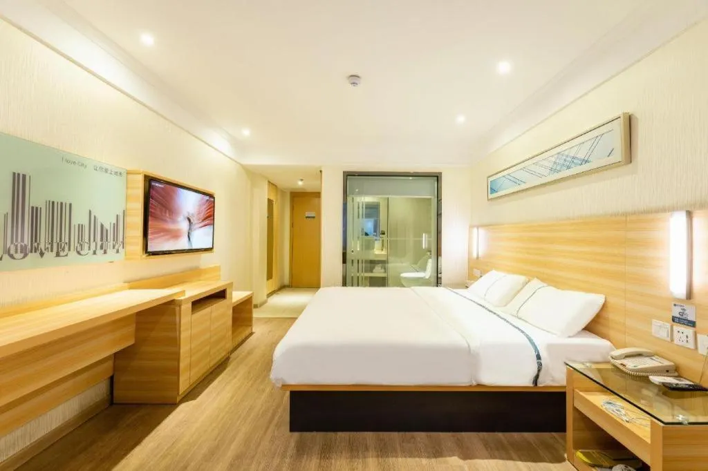 Bed in City Comfort Inn Guangzhou Luyuan Road Taojin Metro Station