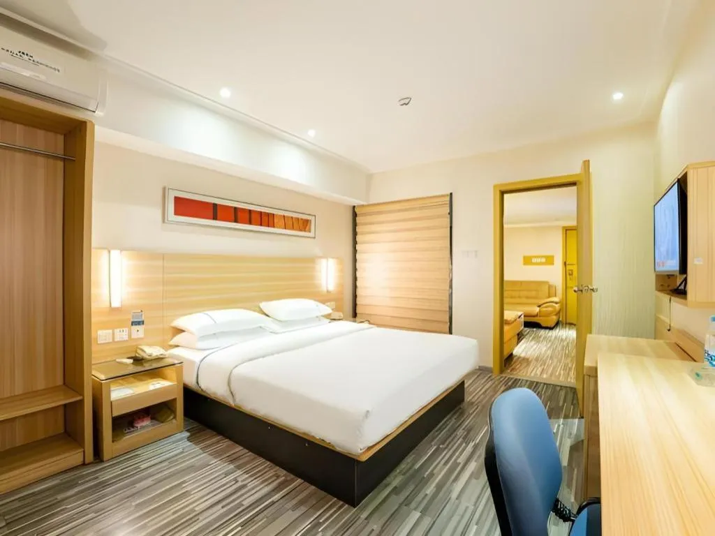 Bed in City Comfort Inn Guangzhou Luyuan Road Taojin Metro Station