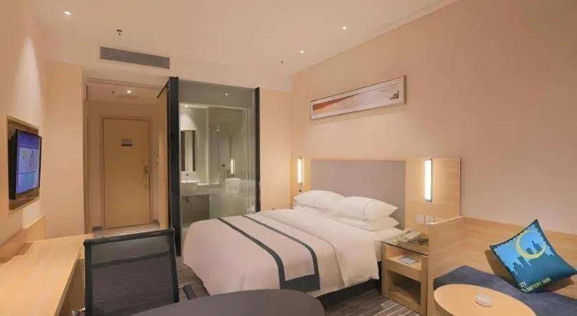 Bed in City Comfort Inn Guangzhou Luyuan Road Taojin Metro Station