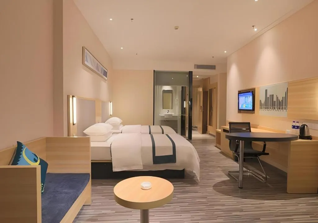 Bed in City Comfort Inn Guangzhou Luyuan Road Taojin Metro Station