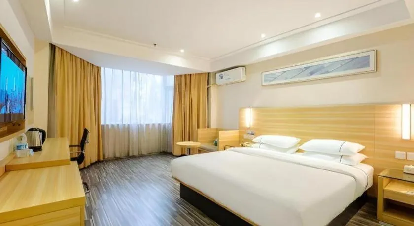 Bed in City Comfort Inn Guangzhou Luyuan Road Taojin Metro Station