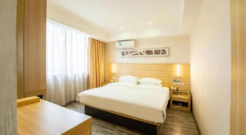 Bed in City Comfort Inn Guangzhou Luyuan Road Taojin Metro Station